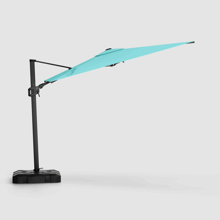 Black offset cantilever patio umbrella with an Aruba Sunbrella canopy