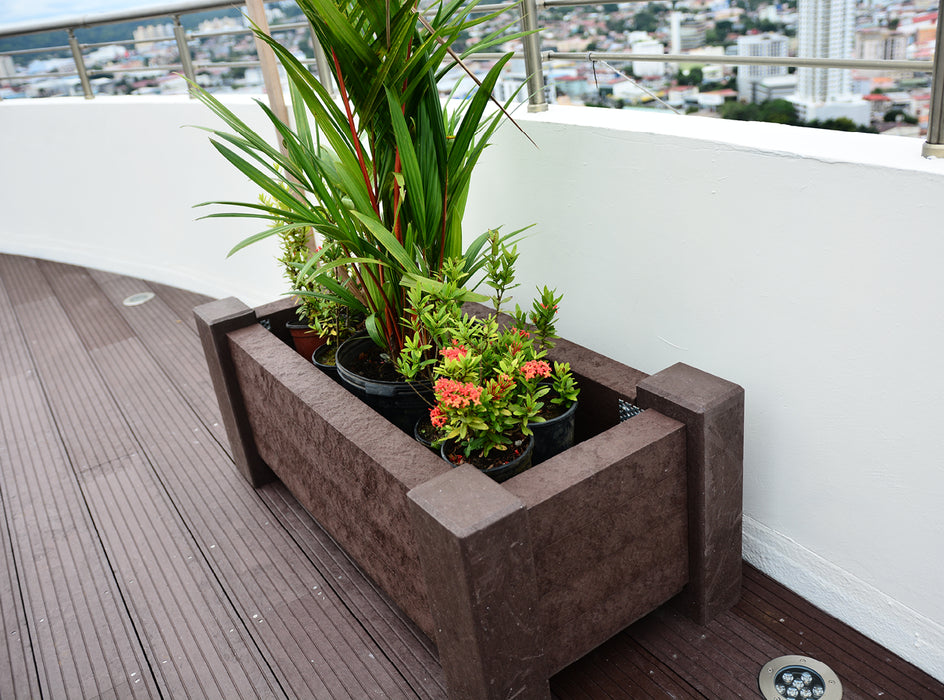 Tobermory Muscari recycled plastic planter with landscaping